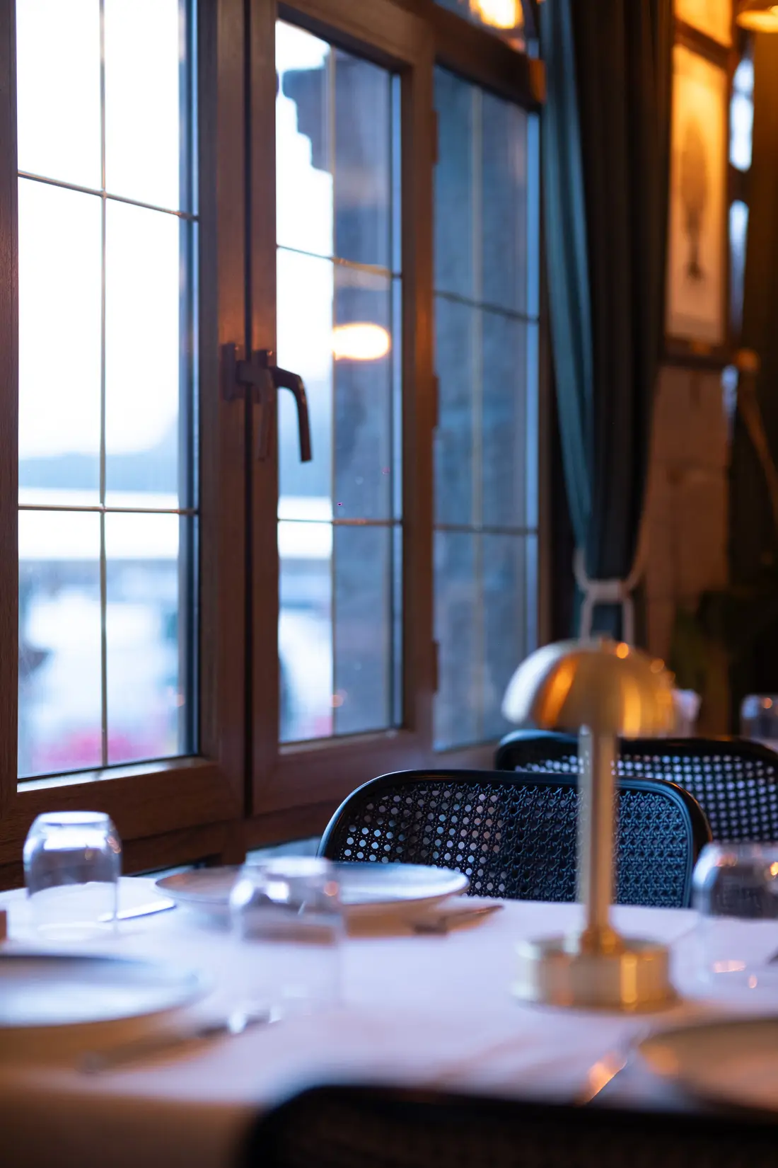 A table set by a sea-view window